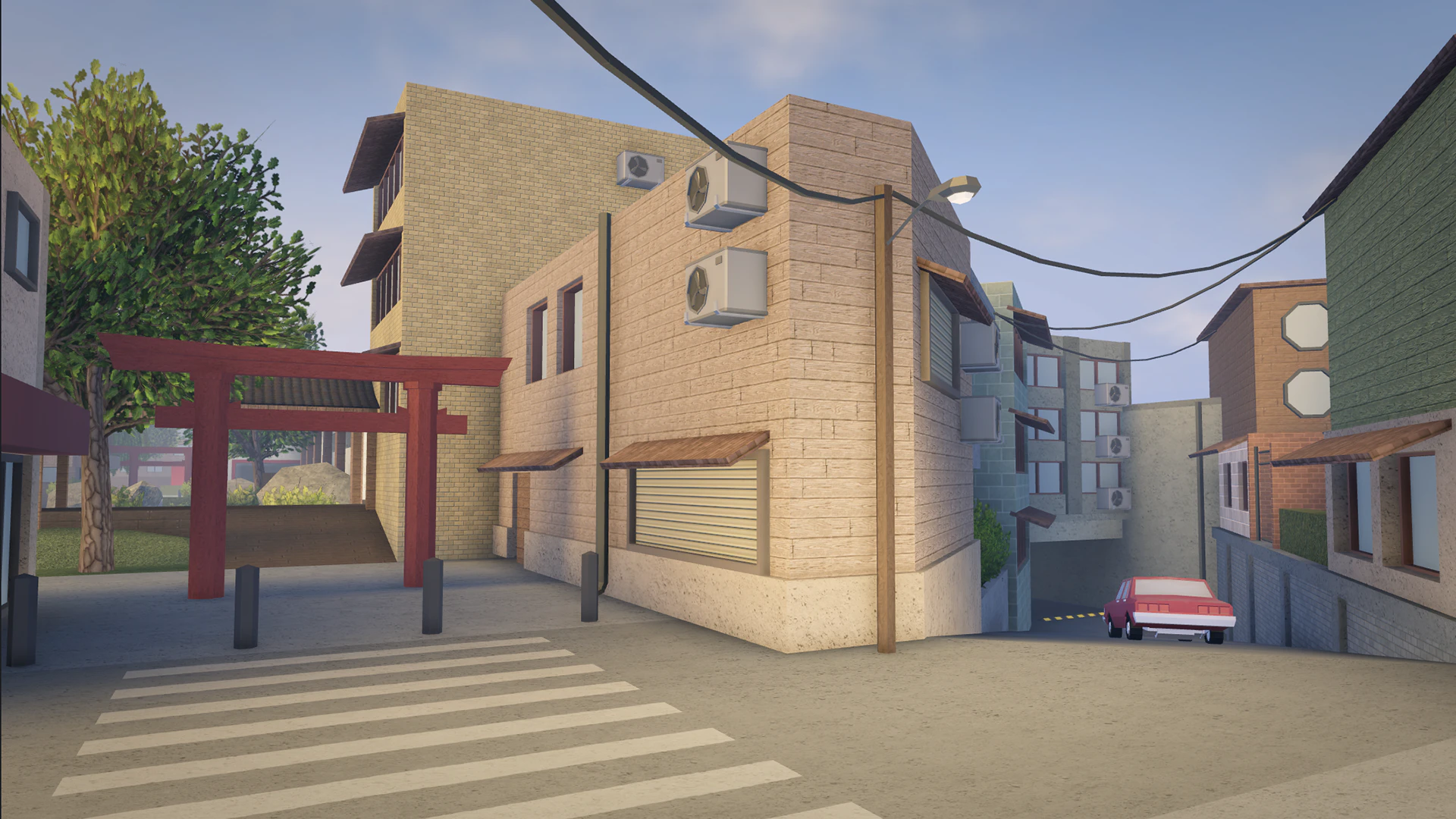 Street corner with a torii gate, brick buildings and overhead power lines